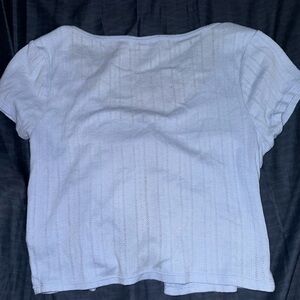 blue knit button top